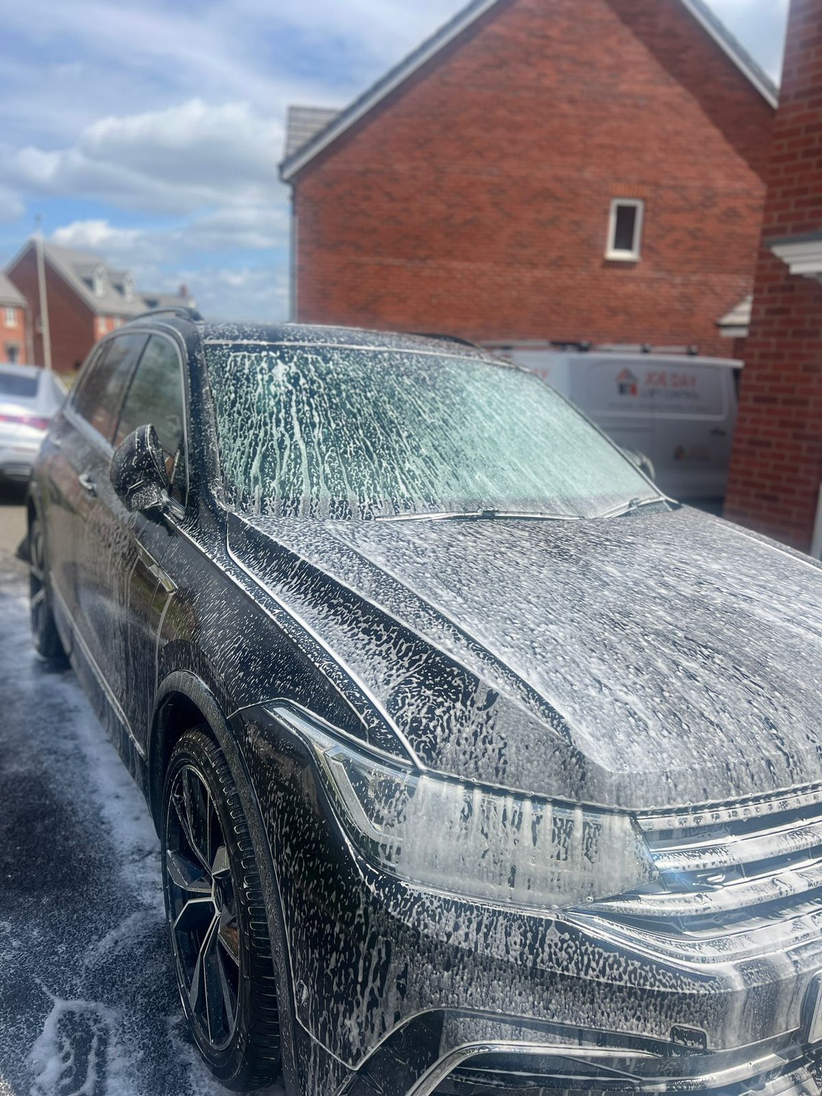 VW Tiguan snow foam wash in progress